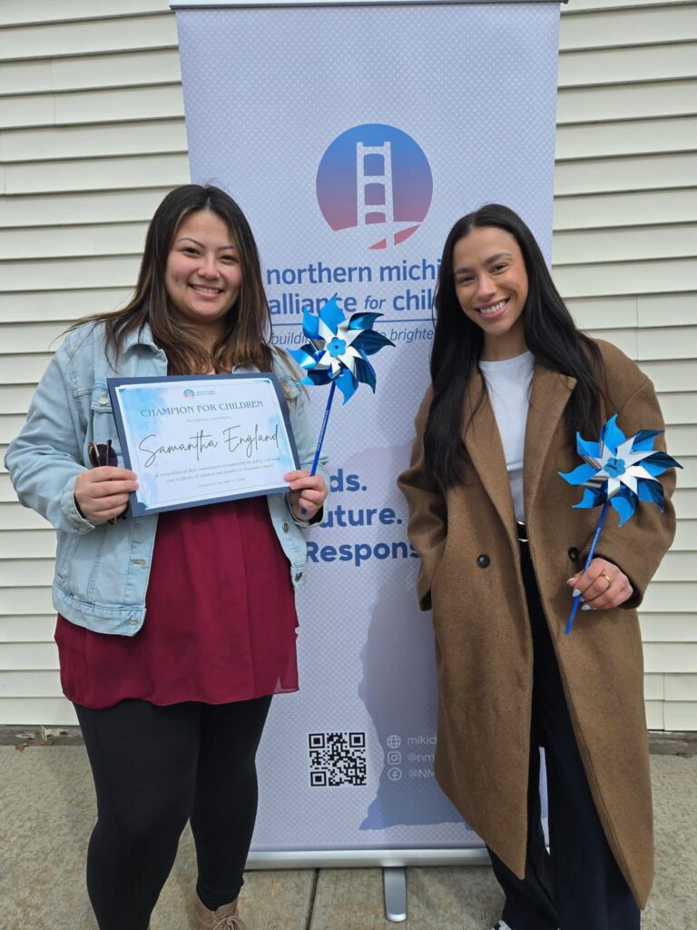 Samantha England (left) with Elisha Call (right), interim executive director for the Northern Michigan Alliance for Children.